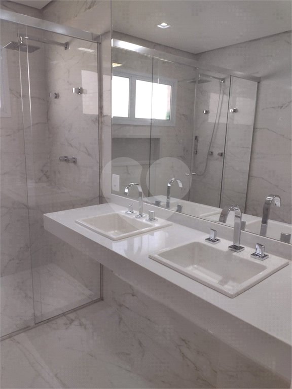 Casa à venda com 4 suítes no condomínio Estância Marambaia, Vinhedo - SP