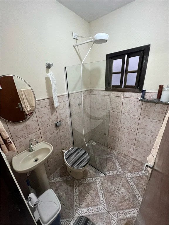Casa à venda com 4 quartos, sendo 1 suíte,  em Costa do Sol, Bertioga, SP