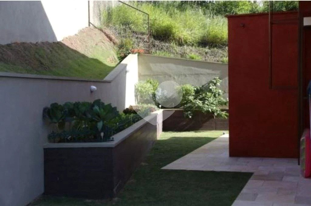 Casa à venda com 4 suítes no condomínio Suíça da Cantareira, Mairiporã - SP