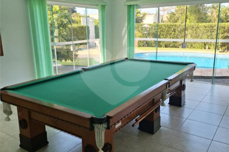 Casa à venda com 4 suítes no condomínio Bougainville, Peruíbe - SP