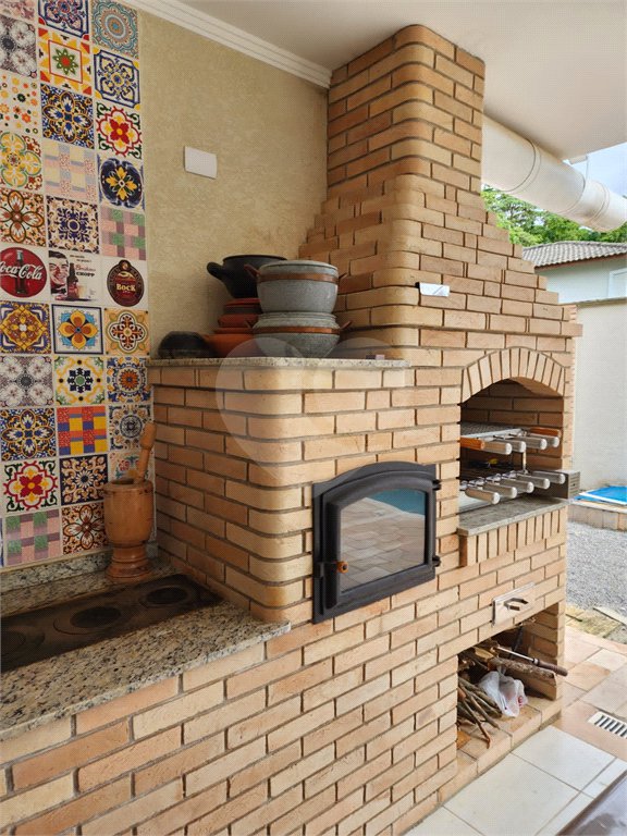 Casa à venda com 4 suítes no condomínio Pedra Grande, Atibaia - SP