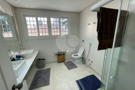 Casa à venda com 4 suítes no condomínio Fechado, São Paulo - SP