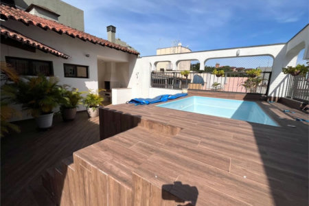 Apartamento com 4 dormitórios à venda, 259 m² por R$ 900.000,00 - Jardim Três Marias - Guarujá/SP
