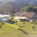 Casa à venda com 4 suítes no condomínio Suíça da Cantareira, Mairiporã - SP