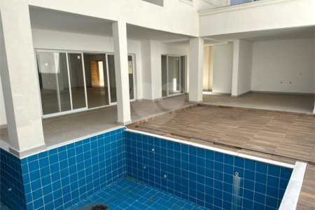 Casa à venda com 4 suítes no condomínio Villaggio Houda, São Paulo - SP