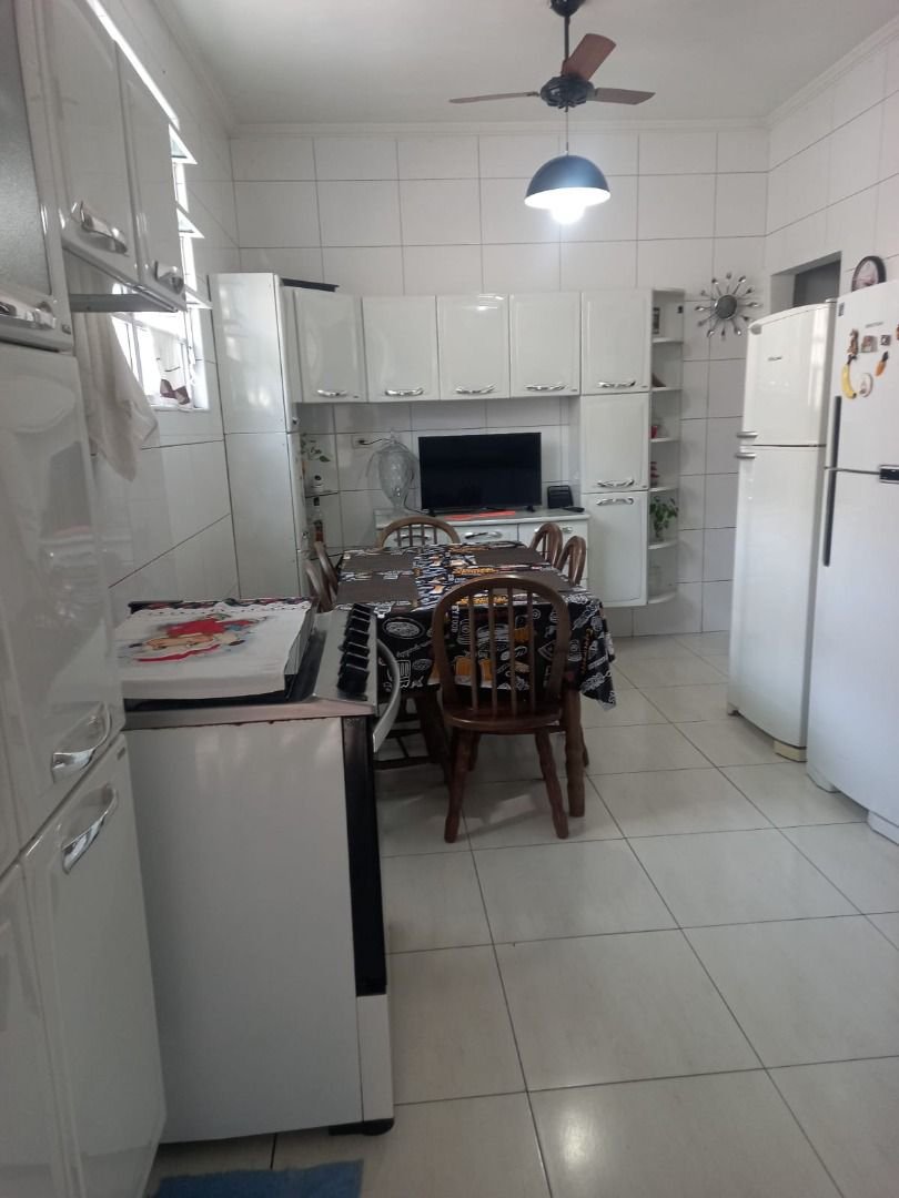 Casa com 3 dormitórios à venda, 110 m² por R$ 590.000,00 - Jardim Paraíso - São Vicente/SP