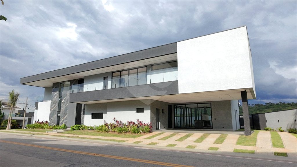 Casa à venda com 5 suítes no condomínio Figueira Garden, Atibaia - SP