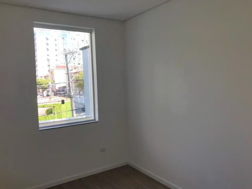 Casa com 3 dormitórios à venda, 116 m² por R$ 690.000,00 - Gonzaga - Santos/SP
