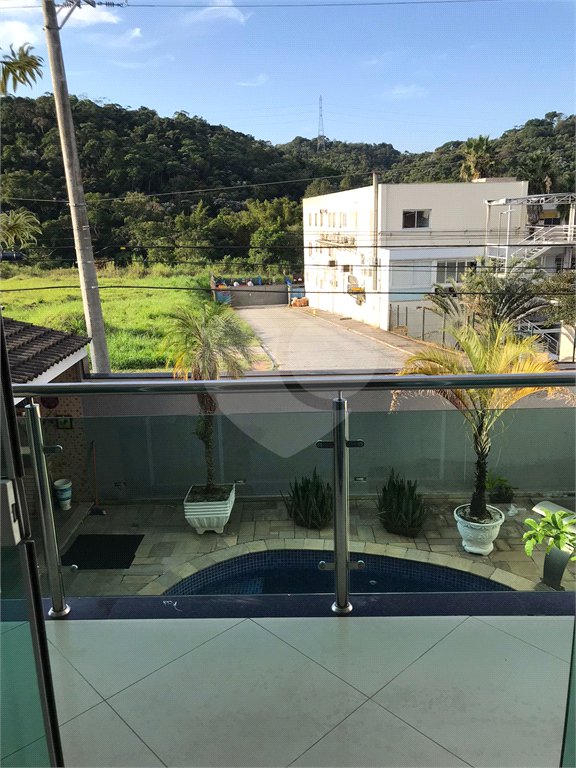 Casa à venda com 4 suítes no condomínio Aruã, Mogi das Cruzes - SP