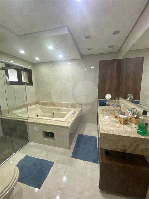 Casa à venda com 4 suítes no condomínio Vale da Santa Fé, Vinhedo - SP