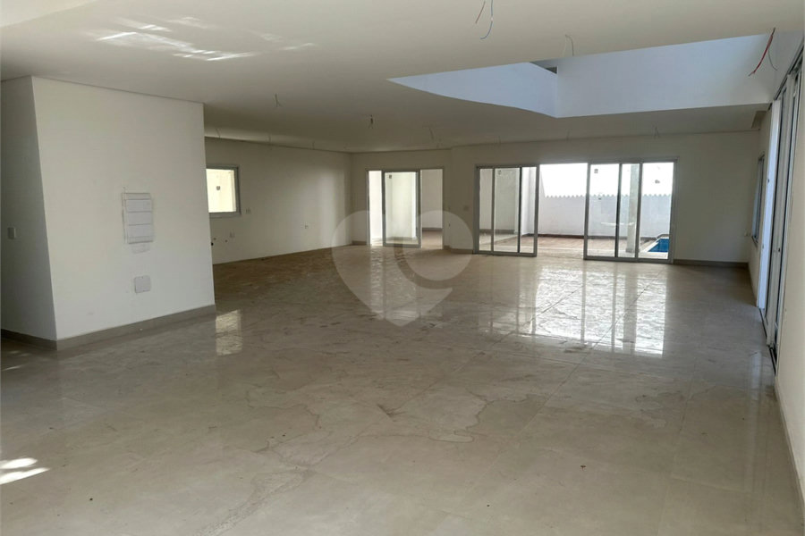 Casa à venda com 4 suítes no condomínio Villaggio Houda, São Paulo - SP