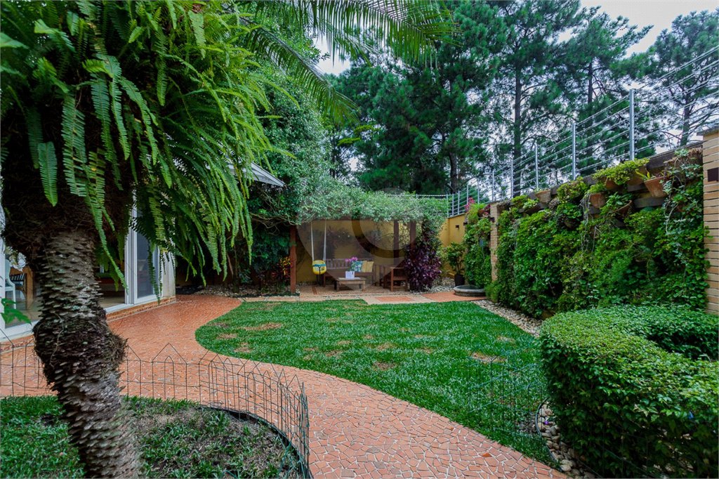 Casa à venda com 4 suítes no condomínio Las Cumbres, São Paulo - SP