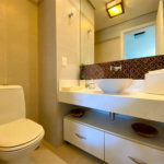 Apartamento à venda com 4 suítes em Riviera de São Lourenço, Bertioga, SP