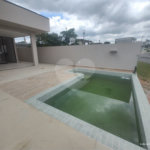 Casa exclusiva em Atibaia de alto padrão com 3 suítes, piscina, espaço gourmet, condomínio fechado, aceita financiamento