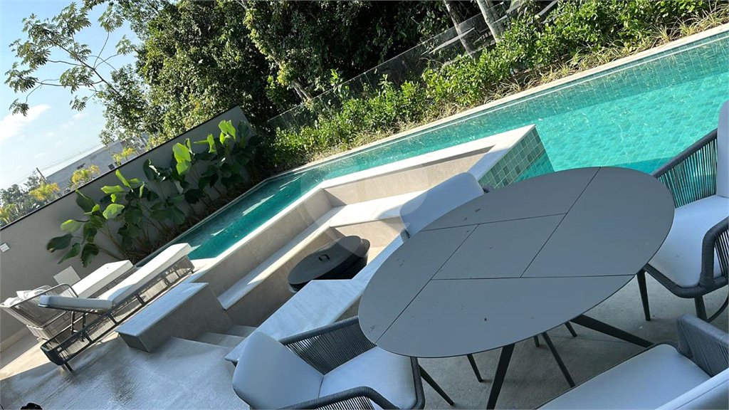 Casa à venda com 6 suítes no condomínio Golf CL, Bertioga - SP