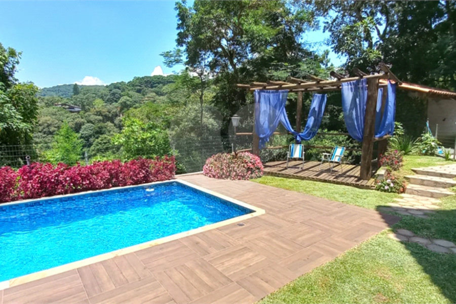 Casa à venda com 4 suítes no condomínio Alpes da Cantareira, Mairiporã - SP