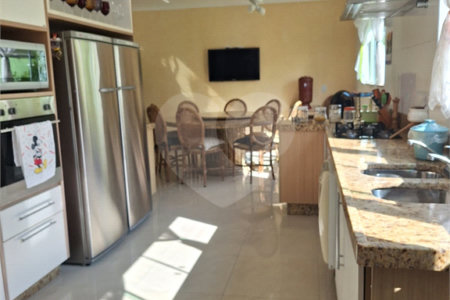 Casa à venda com 4 suítes no condomínio Bougainville, Peruíbe - SP
