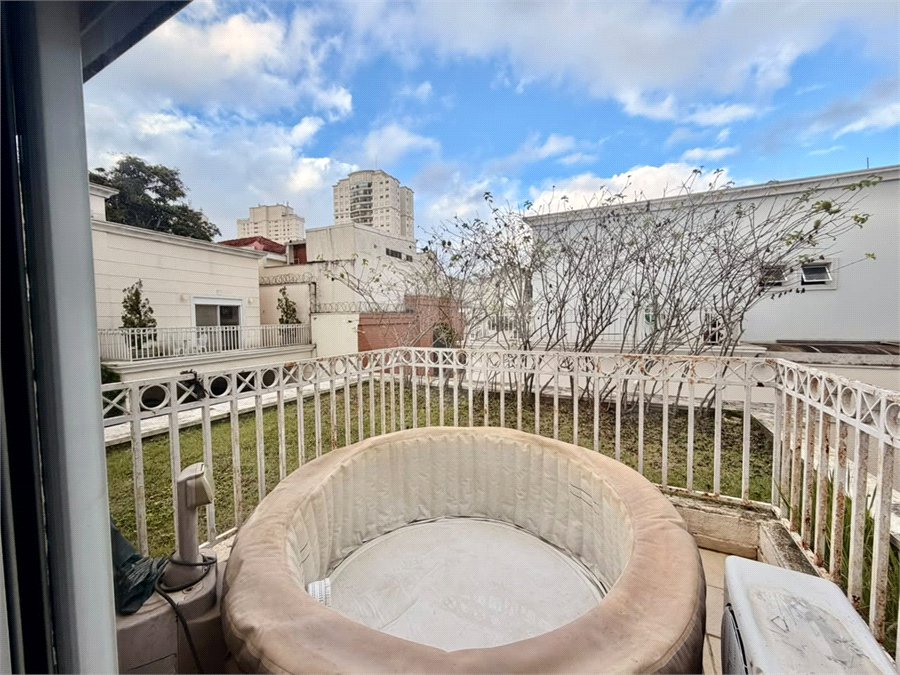 Casa à venda com 3 suítes no condomínio Villaggio Della Hípica, São Paulo - SP