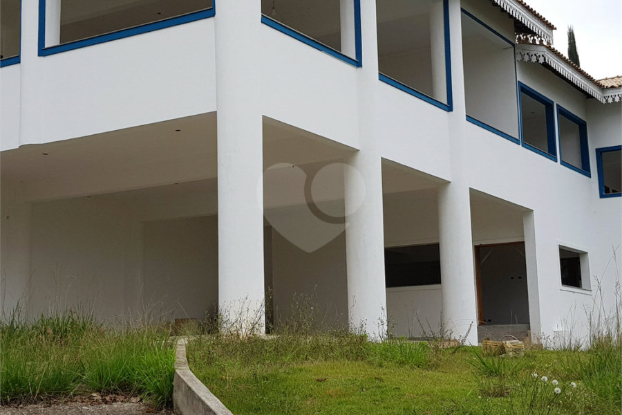 Casa à venda com 4 suítes no condomínio Suíça da Cantareira, Mairiporã - SP