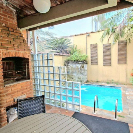 Casa com 3 dormitórios à venda, 182 m² por R$ 1.390.000,00 - Campo Grande - Santos/SP