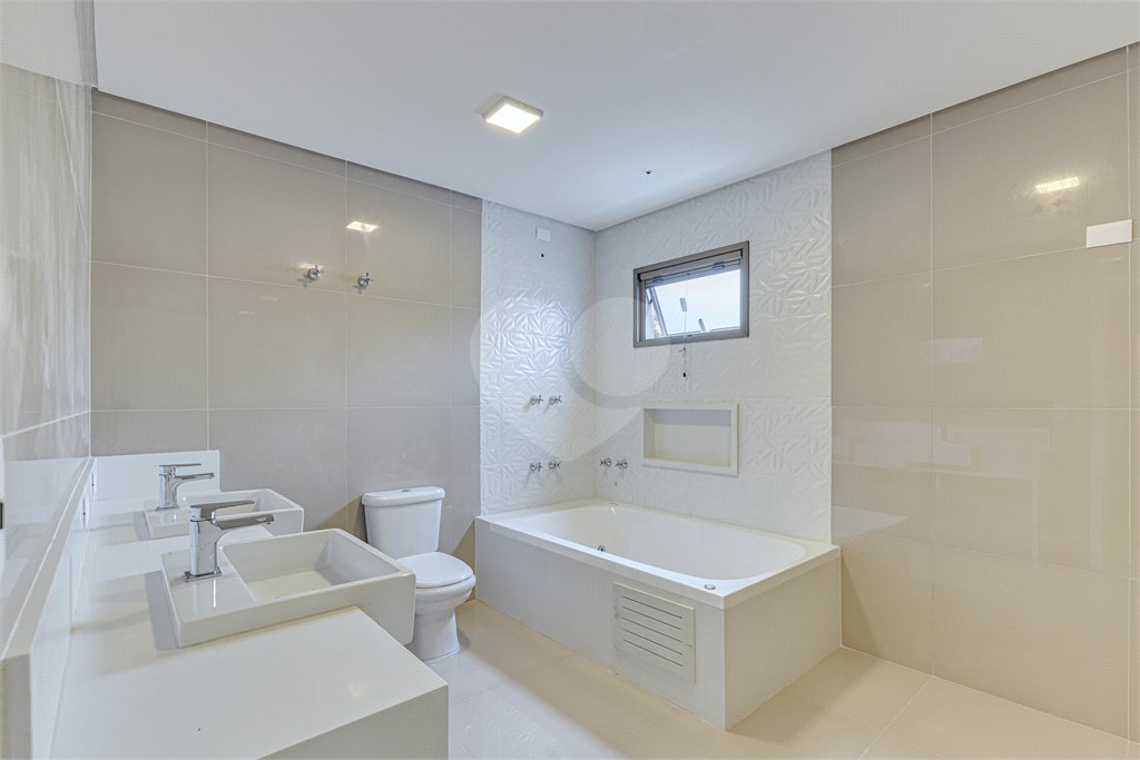 Casa à venda com 4 suítes no condomínio Carmen, São Paulo - SP