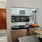 Apartamento térreo , três quartos sendo uma suíte.