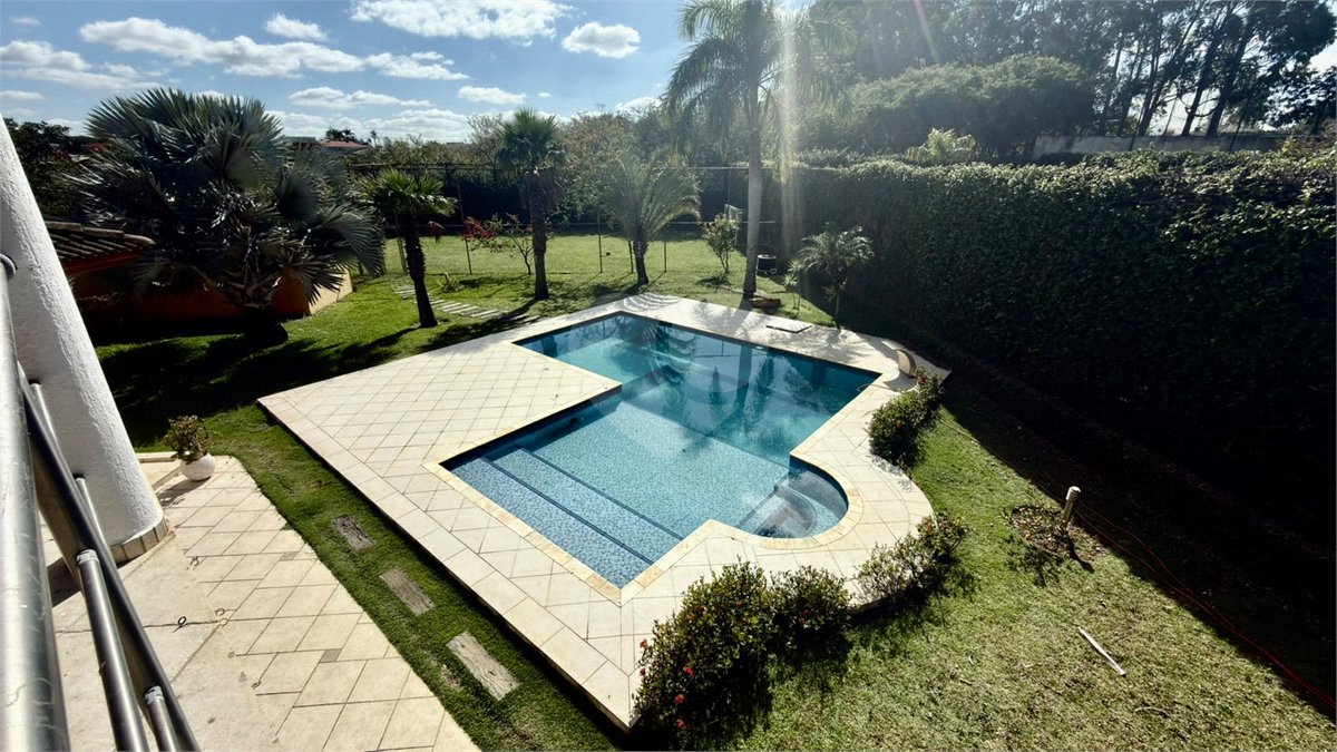 Casa à venda com 4 suítes no condomínio Parque Village Castelo, Itu - SP