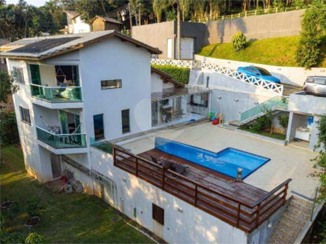 Casa à venda ou para alugar com 4 suítes no condomínio Associação Reserva das Hortênsias, Mairiporã - SP