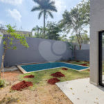 Casa à venda com 4 suítes no condomínio Reserva Robélia, São Paulo - SP