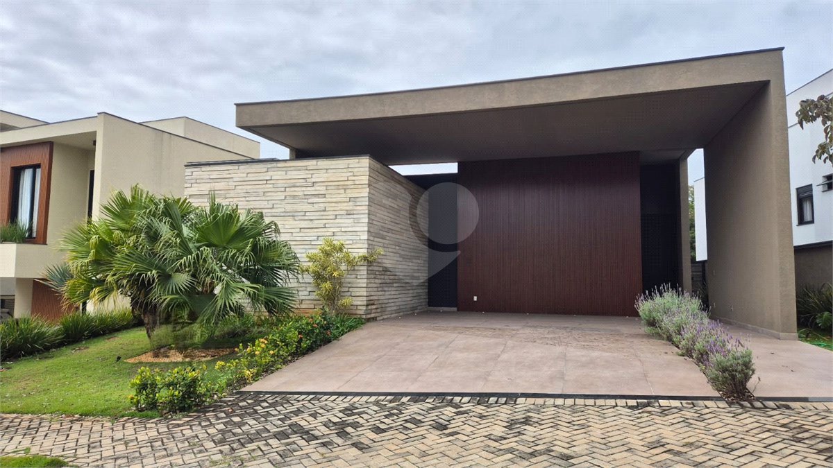 Casa à venda com 4 suítes no condomínio Alphaville Nova Esplanada 1, Votorantim - SP