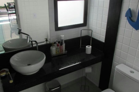 Casa de Alto Padrão com 5 Suítes e Lazer Completo– Guarujá