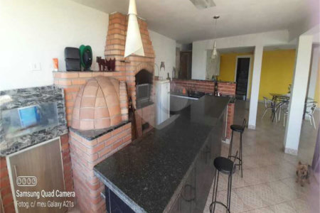 Casa à venda com 4 suítes no condomínio Residencial Vale das Laranjeiras, Indaiatuba - SP