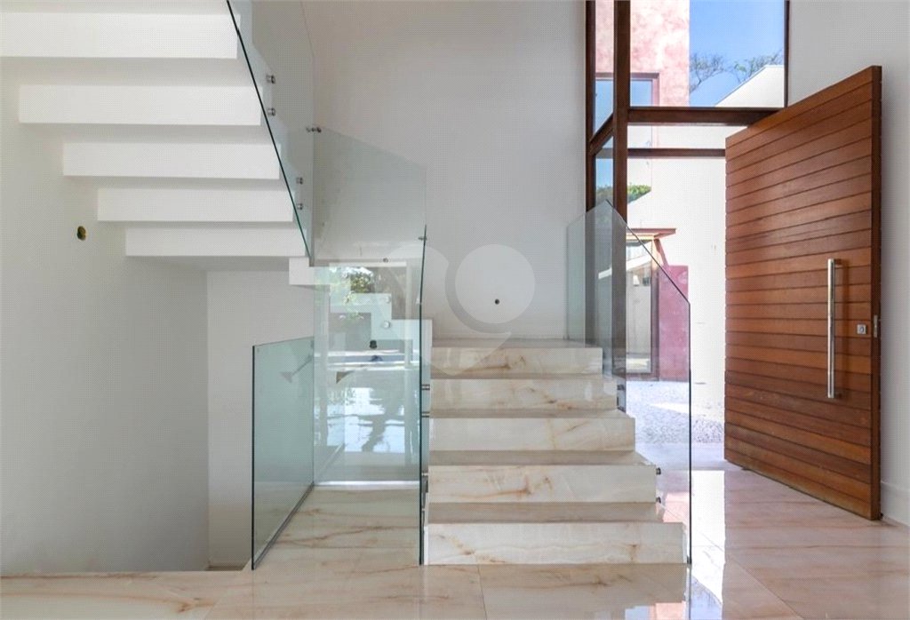 Casa à venda com 4 suítes no condomínio Porto Fino, São Paulo - SP
