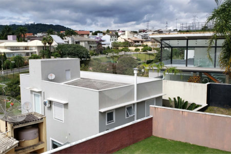 Casa à venda com 4 suítes no condomínio Real Park, Mogi das Cruzes - SP