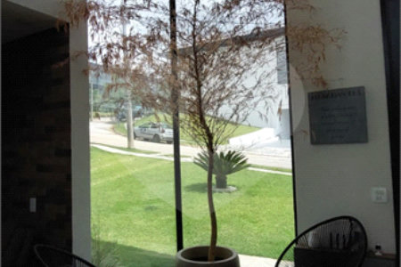 Casa à venda ou para alugar com 4 suítes no condomínio Figueira Garden, Atibaia - SP