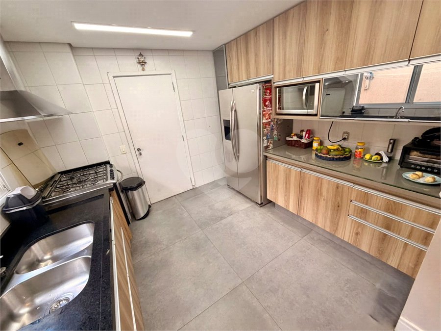 Casa à venda com 3 suítes no condomínio Villaggio Della Hípica, São Paulo - SP