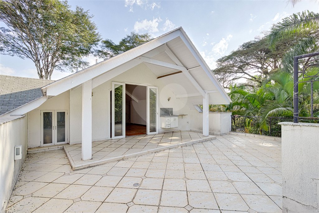 Casa à venda com 4 suítes no condomínio Solar Andaluz, São Paulo - SP