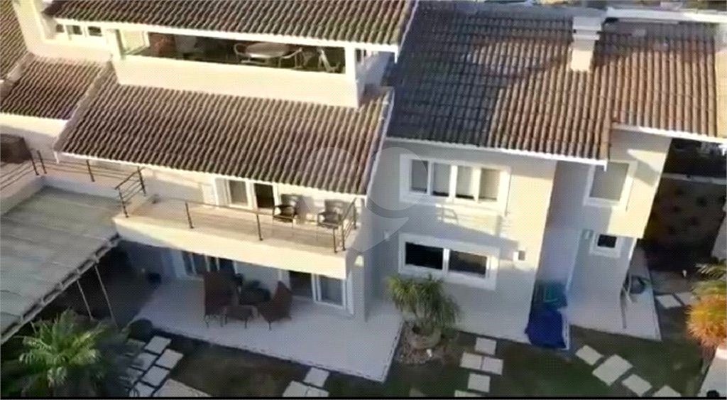 Casa à venda com 5 suítes no condomínio Parque Arco Iris, Atibaia - SP