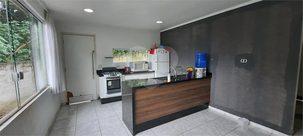 Casa à venda com 3 quartos, sendo 1 suíte, no condomínio Alpes da Cantareira, Mairiporã - SP
