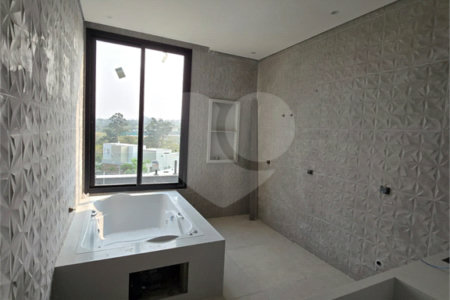 Casa à venda com 4 quartos, sendo 3 suítes, no condomínio Alphaville Nova Esplanada 4, Votorantim - SP