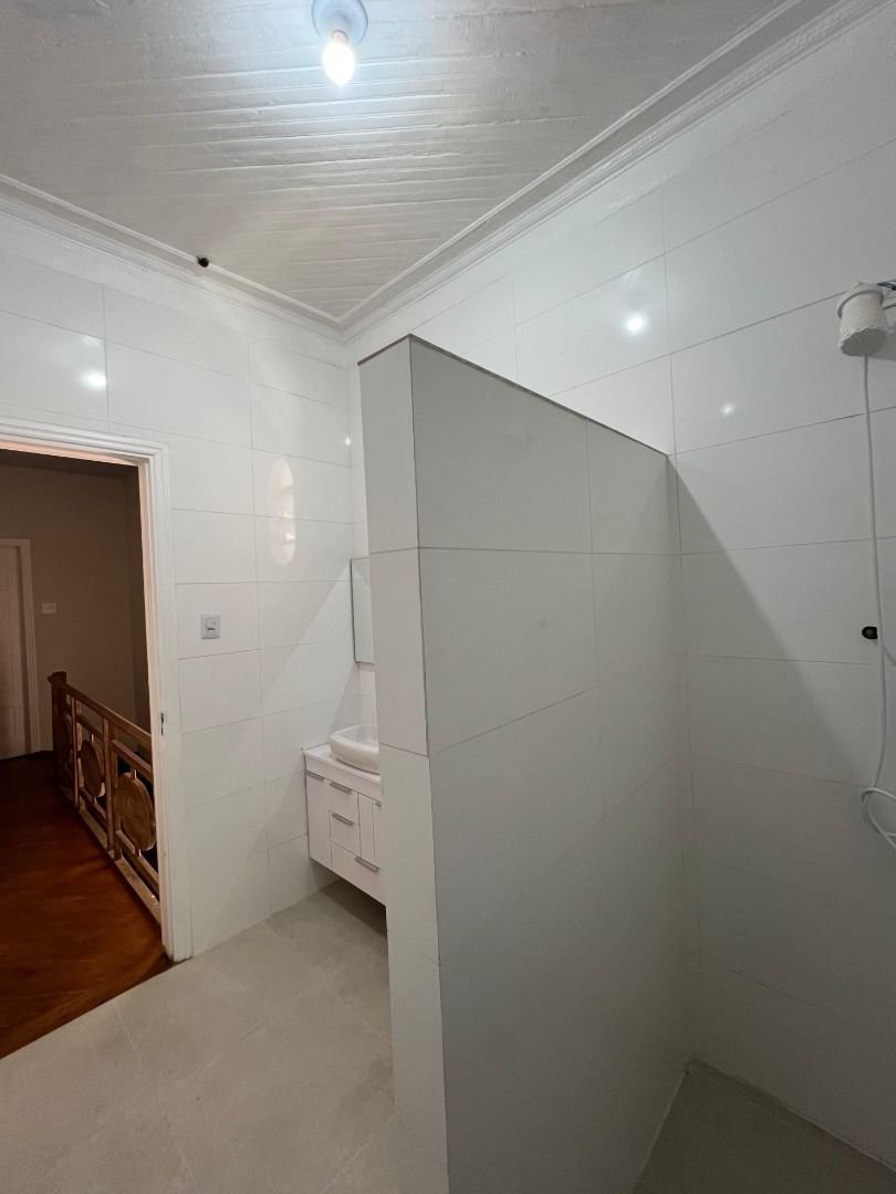 Casa com 3 dormitórios para alugar, 284 m² por R$ 21.162,89 - Gonzaga - Santos/SP