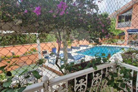 Casa à venda com 4 suítes no condomínio Estância Marambaia, Vinhedo - SP