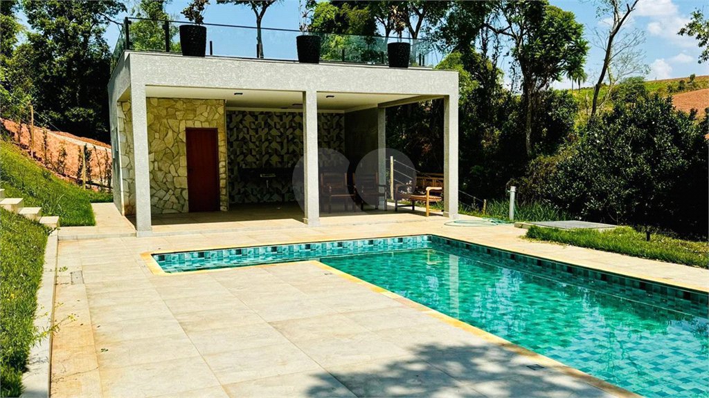 Casa à venda com 4 suítes no condomínio Associação Portal Ouro Verde, Atibaia - SP