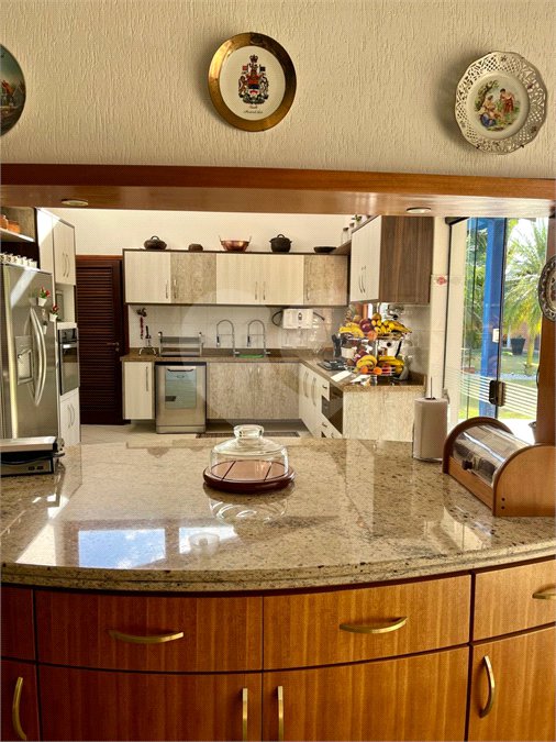 Casa à venda com 4 suítes no condomínio Residencial Vale das Laranjeiras, Indaiatuba - SP