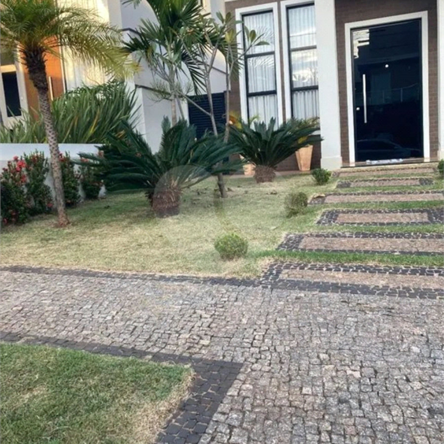 Casa à venda com 3 suítes no condomínio Terras do Cancioneiro, Paulínia - SP