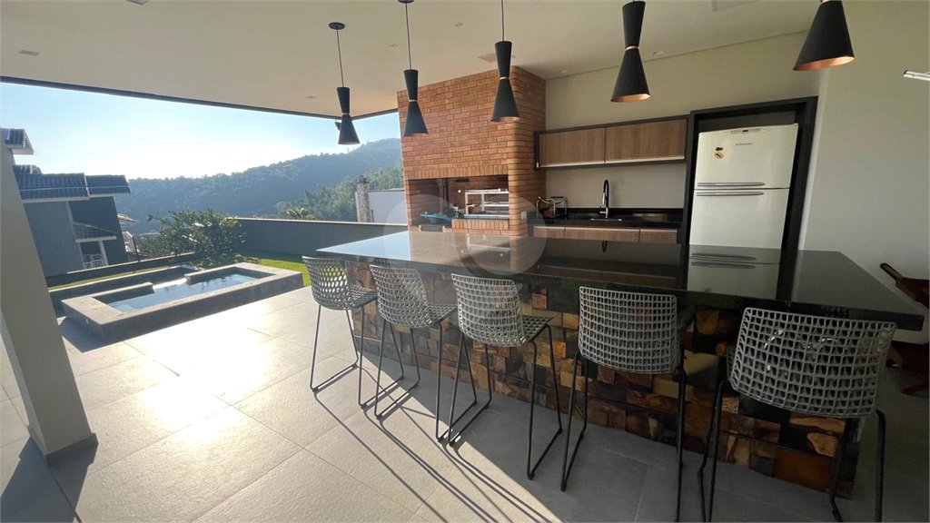 Casa à venda com 4 suítes no condomínio Porto Atibaia, Atibaia - SP