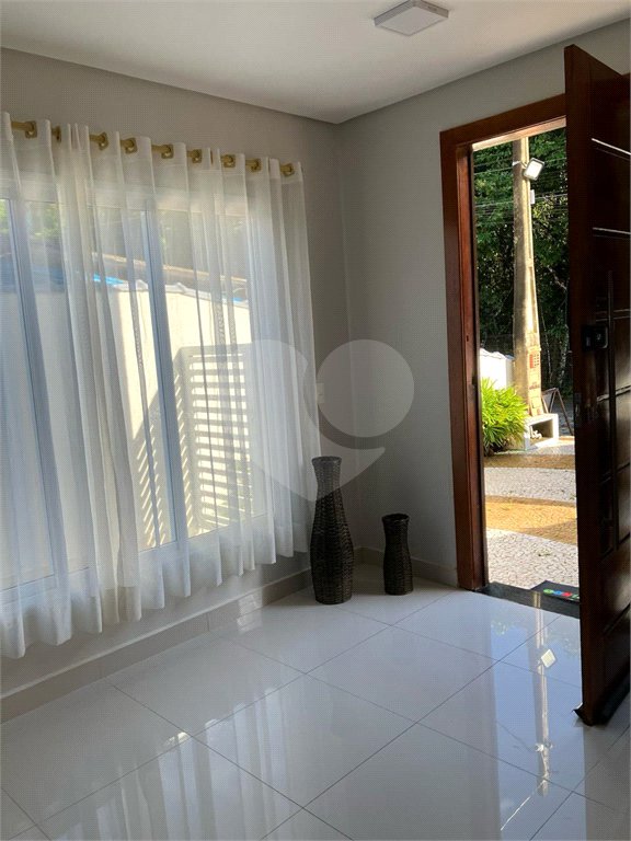 Casa à venda com 4 quartos, sendo 2 suítes,  no condomínio Morada da Praia, Bertioga - SP