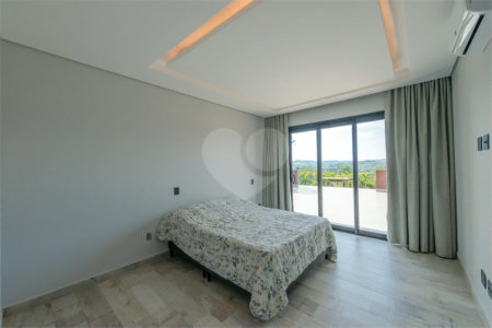 Casa à venda com 4 suítes no condomínio Vale da Santa Fé, Vinhedo - SP