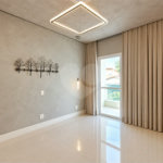 Sobrado geminado com 185 m², 3 suítes, closet, 4 vagas, área gourmet, sótão, energia solar, aquecimento de água e sistema completo de segurança.