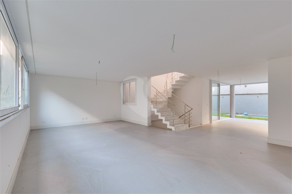 Casa à venda com 4 suítes no condomínio Vila Arese, São Paulo - SP